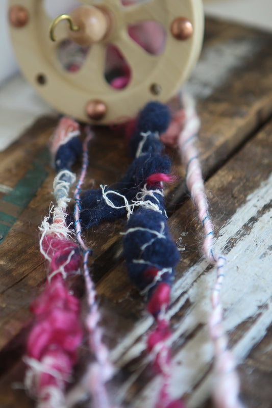 SPINDLING Method 3 - adding a texture wrap thread to your art yarn on a drop spindle